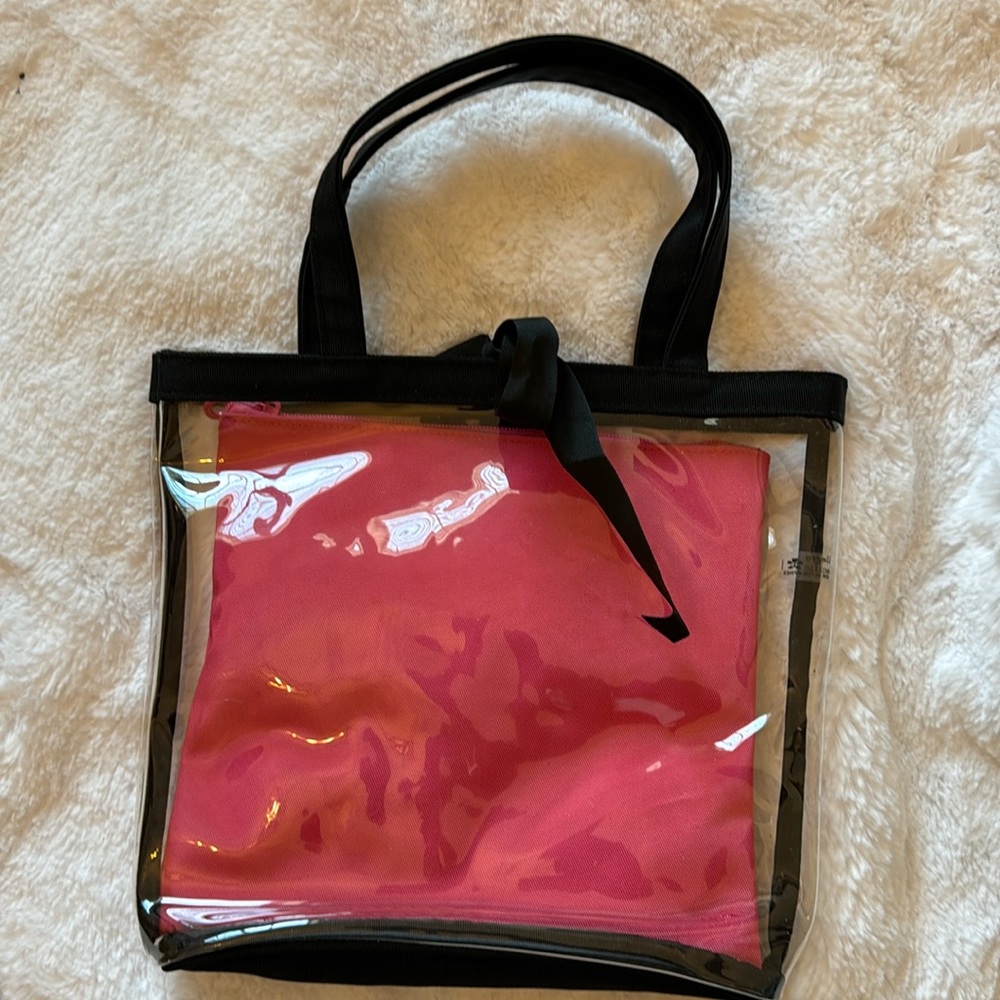 Clear Bag black trim bag with pink insert bag. NWOT